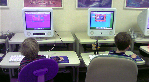 Two kids at computers